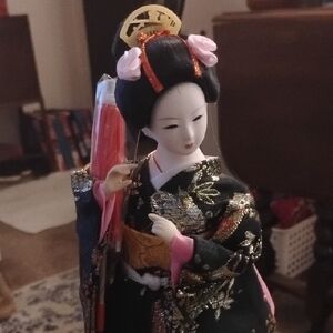 Elegant Geisha Doll with Black and Gold Kimono
